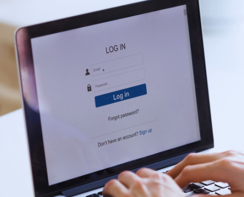 Image of person logging into computer