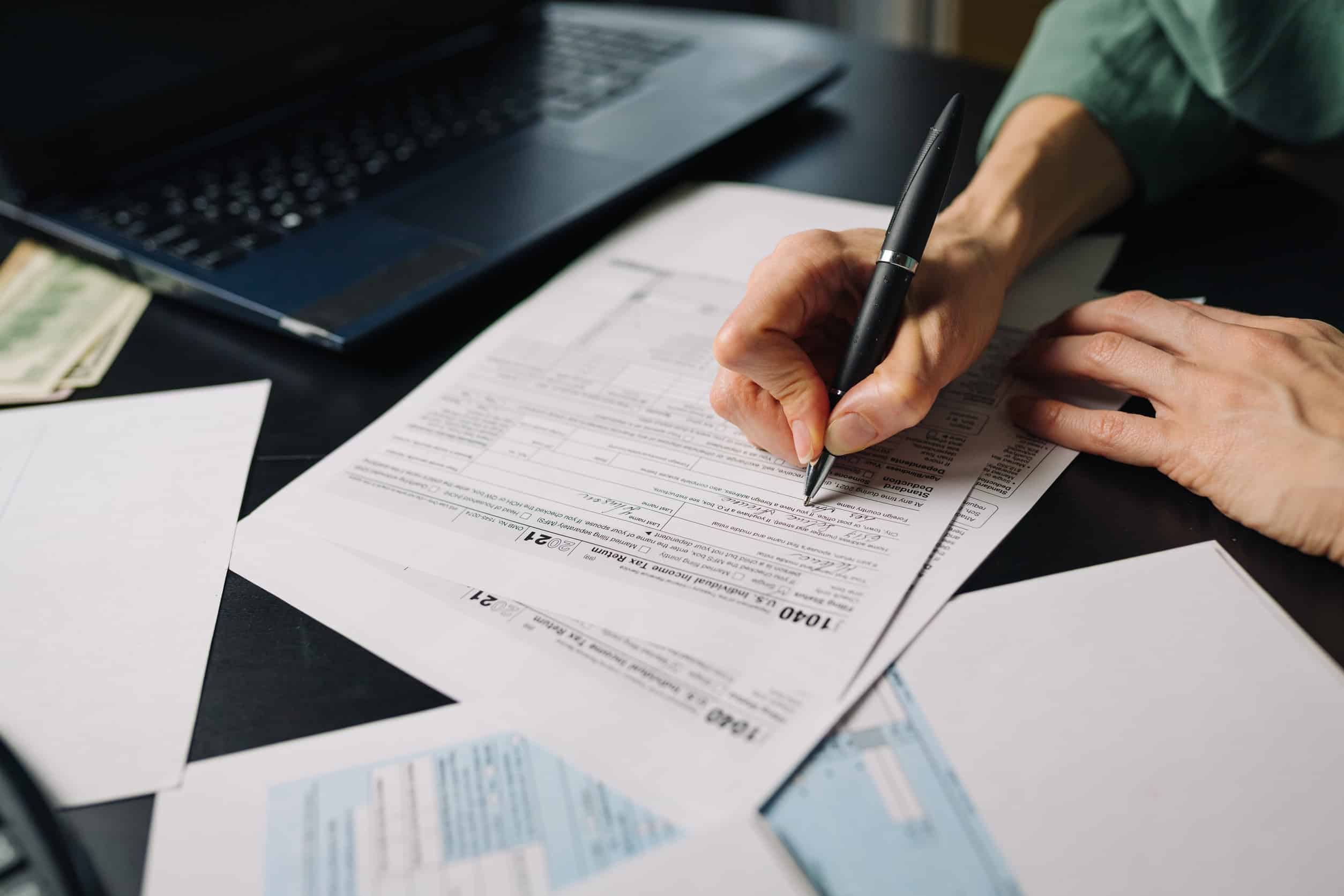 Woman filling US tax form 1040